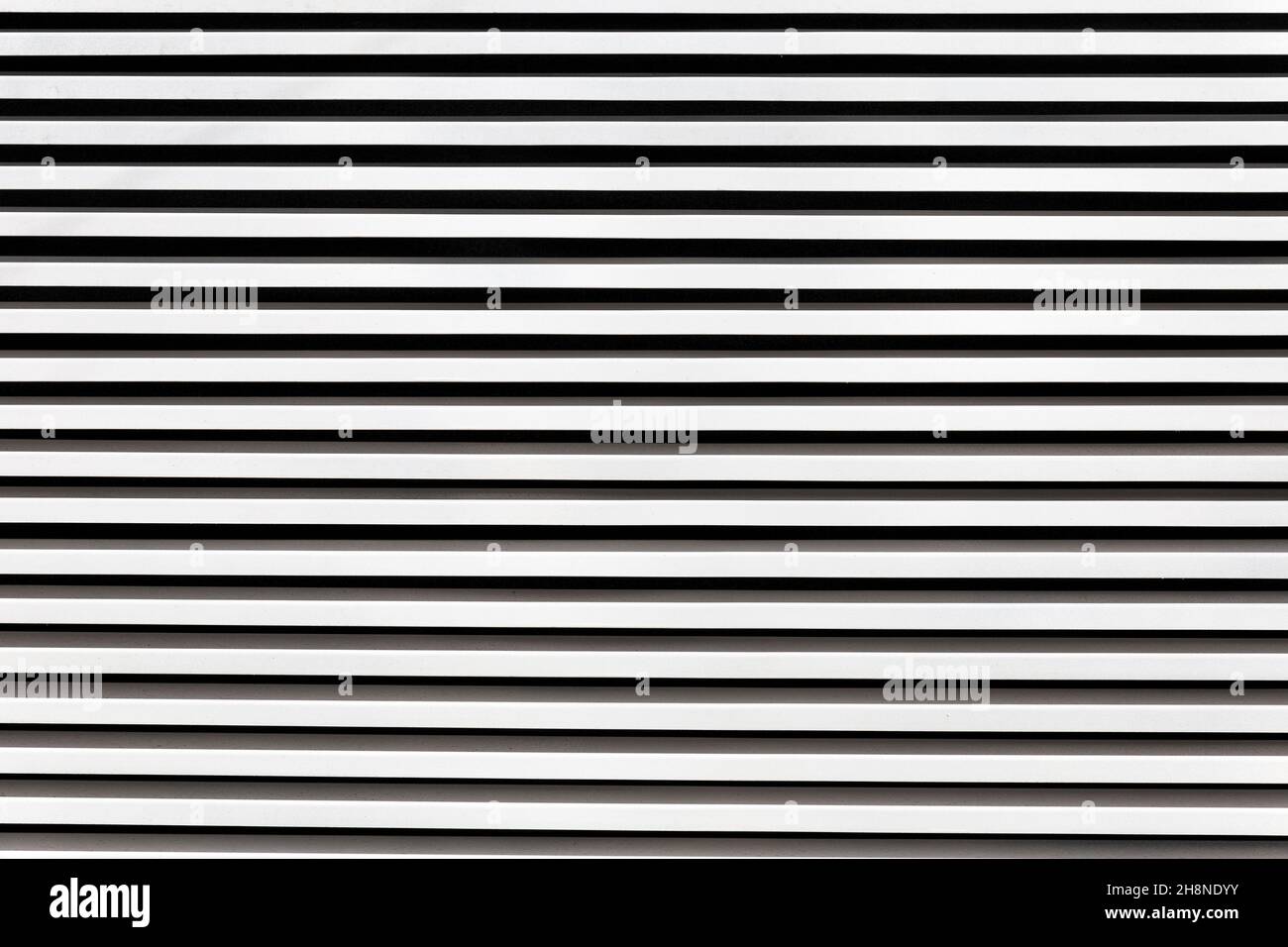surface with symmetrical white metal bars Stock Photo