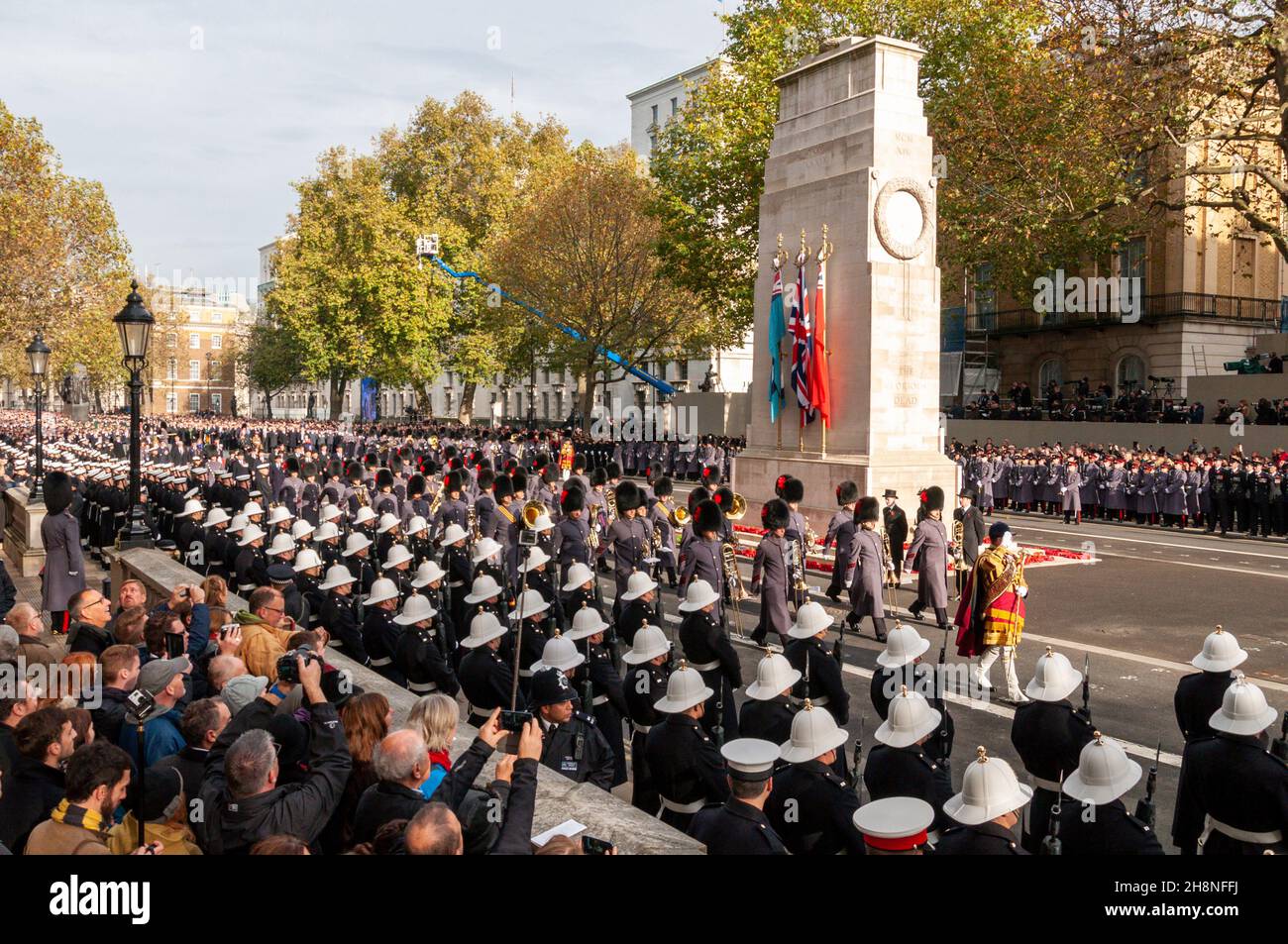 The Cenotaph National Service of Remembrance on Remembrance Sunday. Soldiers march past following the placing of wreaths by dignitaries. Stock Photo