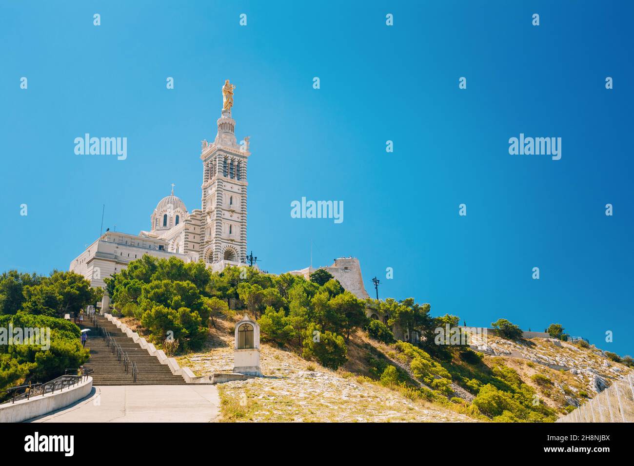 Catholic Basilica of Our Lady of the Guard or Notre Dame De La Garde church at hill in Marseille, France Stock Photo