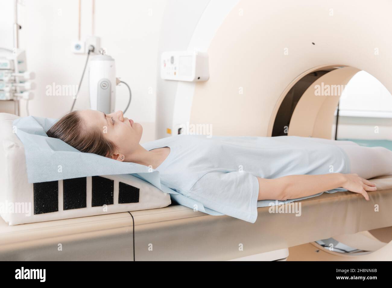 Medical CT or MRI Scan with a patient in the modern hospital laboratory. Interior of radiography department. Technologically advanced equipment in Stock Photo
