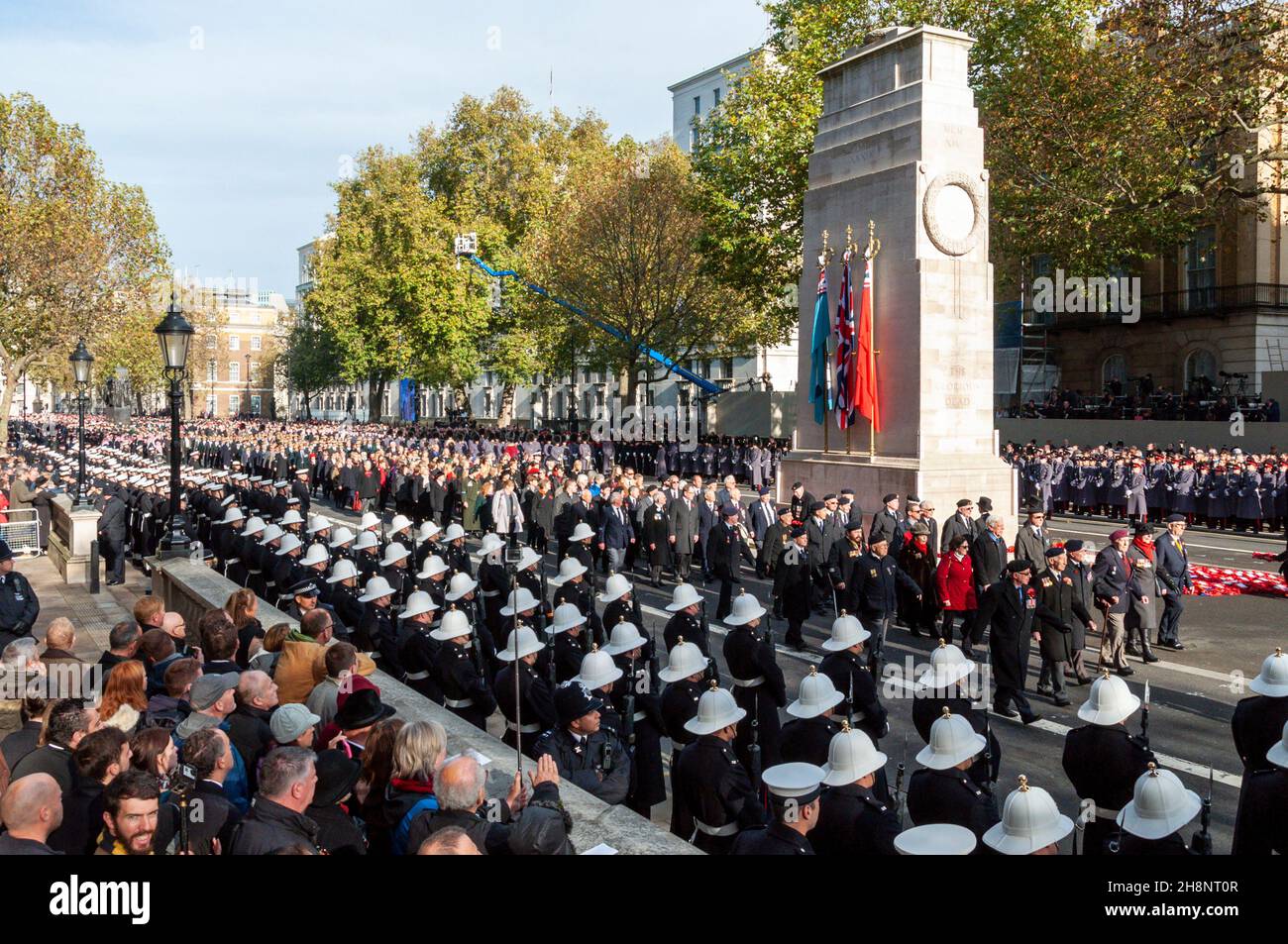 The Cenotaph National Service of Remembrance on Remembrance Sunday. Veterans march past following the placing of wreaths by dignitaries. Stock Photo