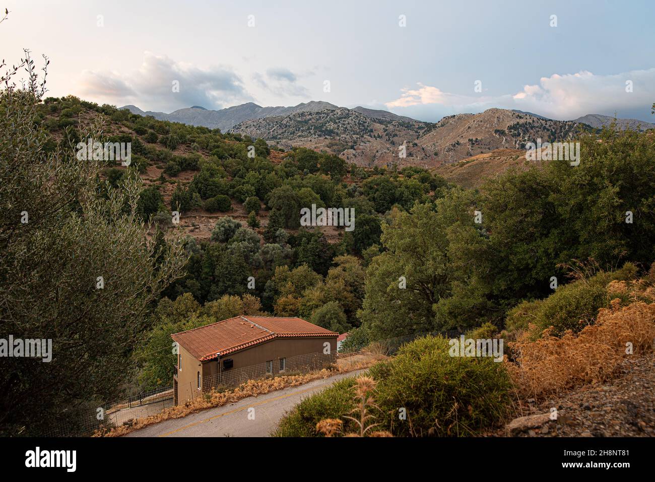 a solitary house in the mountains of Crete with a view over the hills, Theriso, Crete, Greece, October 15, 2021 Stock Photo