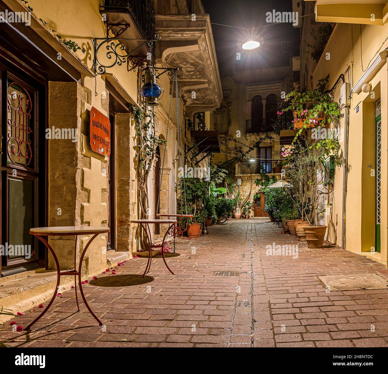 picturesque alley in the old town of Chania, illuminated with a street lamp, Chania, Crete, Greece, October 15, 2021 Stock Photo