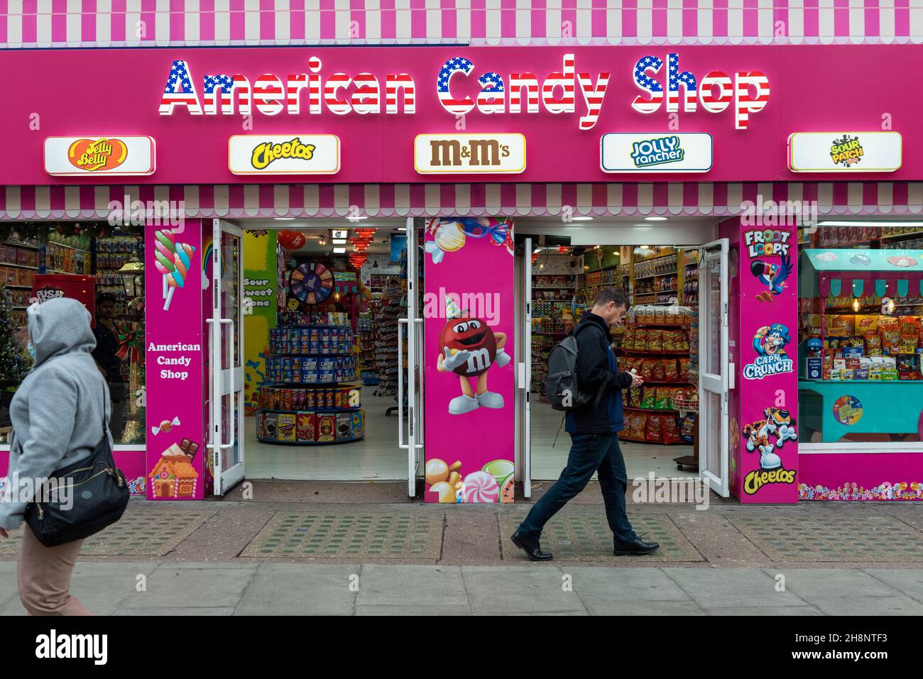 London, UK.  1 December 2021. The exterior of an American-style “candy” store on Oxford Street.  Campaign group Action on Sugar has expressed concern that the increase in the number of such shops opening in the UK, often in economically deprived areas, will give rise to increased childhood obesity and tooth decay such is the sugar content in the products.  The stores occupy space previously occupied by fashion stores or electrical stores which closed due to the pandemic and Brexit benefiting from lower rents. Credit: Stephen Chung / Alamy Live News Stock Photo