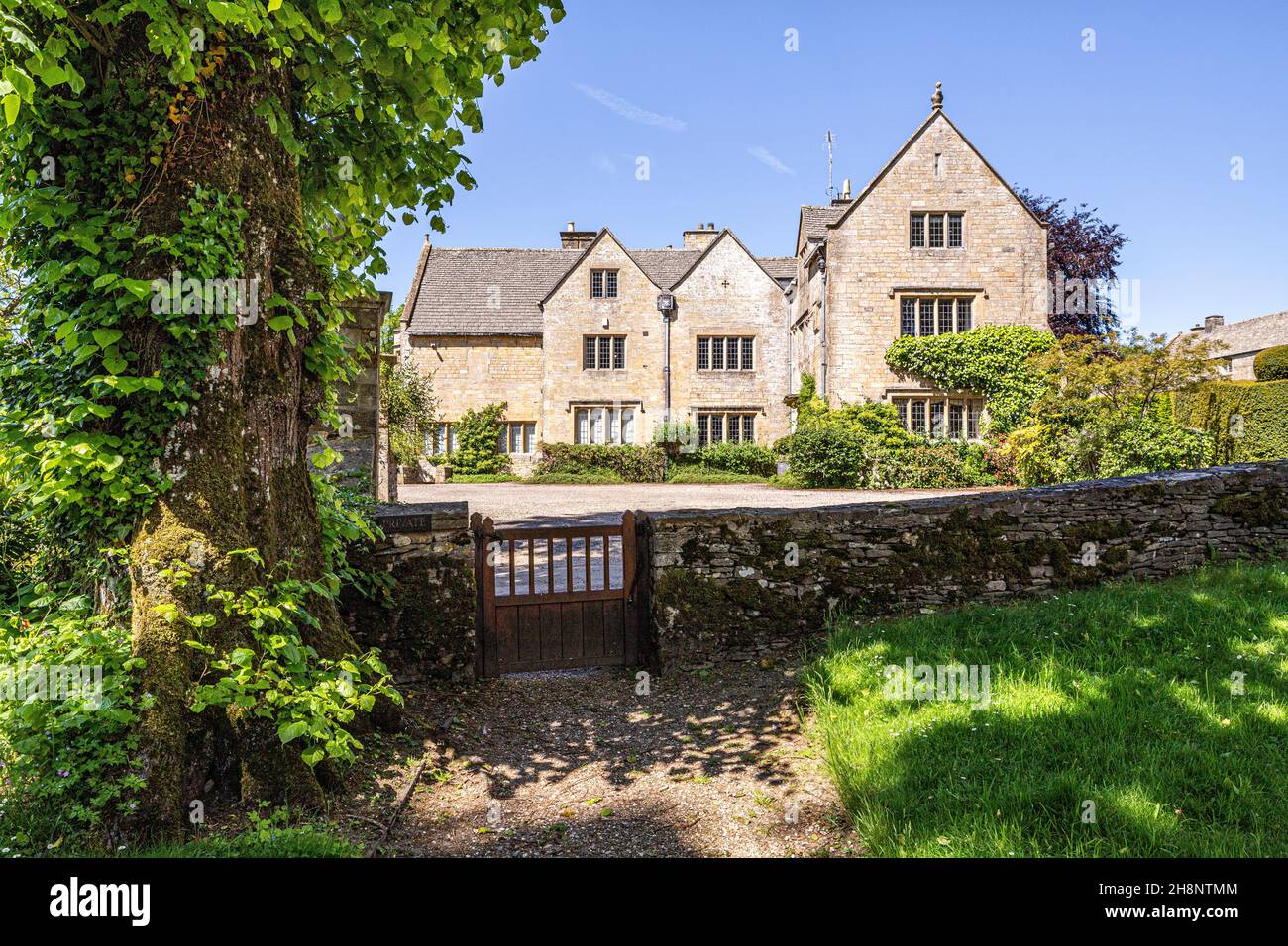 The Manor House dating back to the 15th century in the Cotswold village of Notgrove, Gloucestershire UK Stock Photo