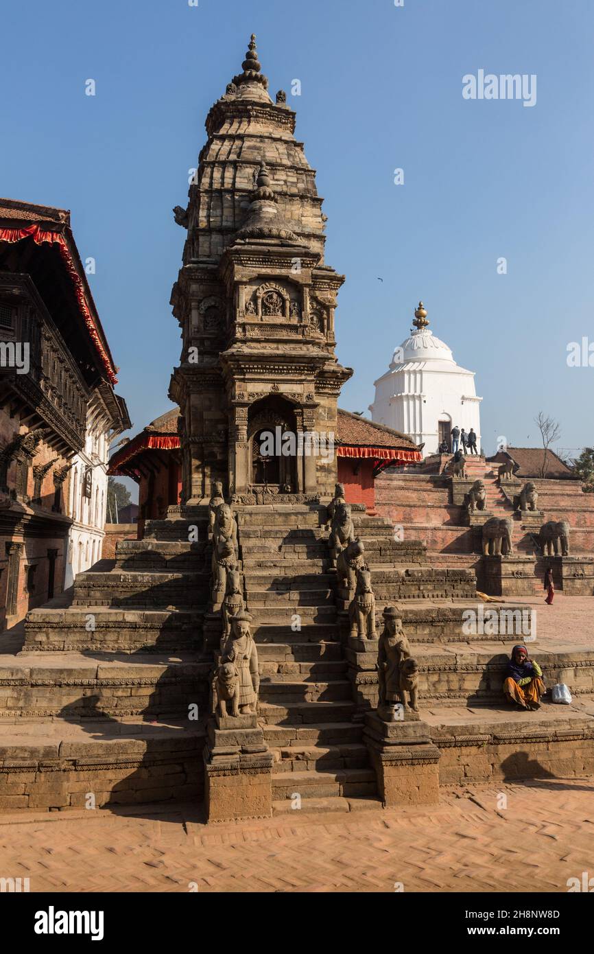 Stone guardians on the Siddhi Laxmi Hindu temple in Durbar Square. Medieval Newar city of Bhaktapur, Nepal. Stock Photo