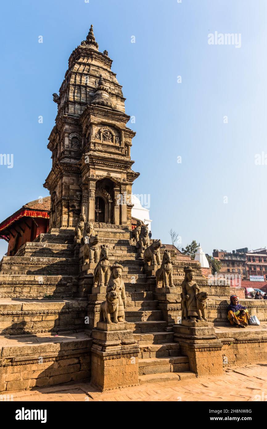 Stone guardians on the Siddhi Laxmi Hindu temple in Durbar Square. Medieval Newar city of Bhaktapur, Nepal. Stock Photo