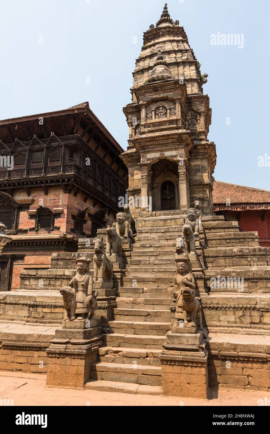 Stone guardians on the Siddhi Laxmi Hindu temple in Durbar Square. Medieval Newar city of Bhaktapur, Nepal. Stock Photo