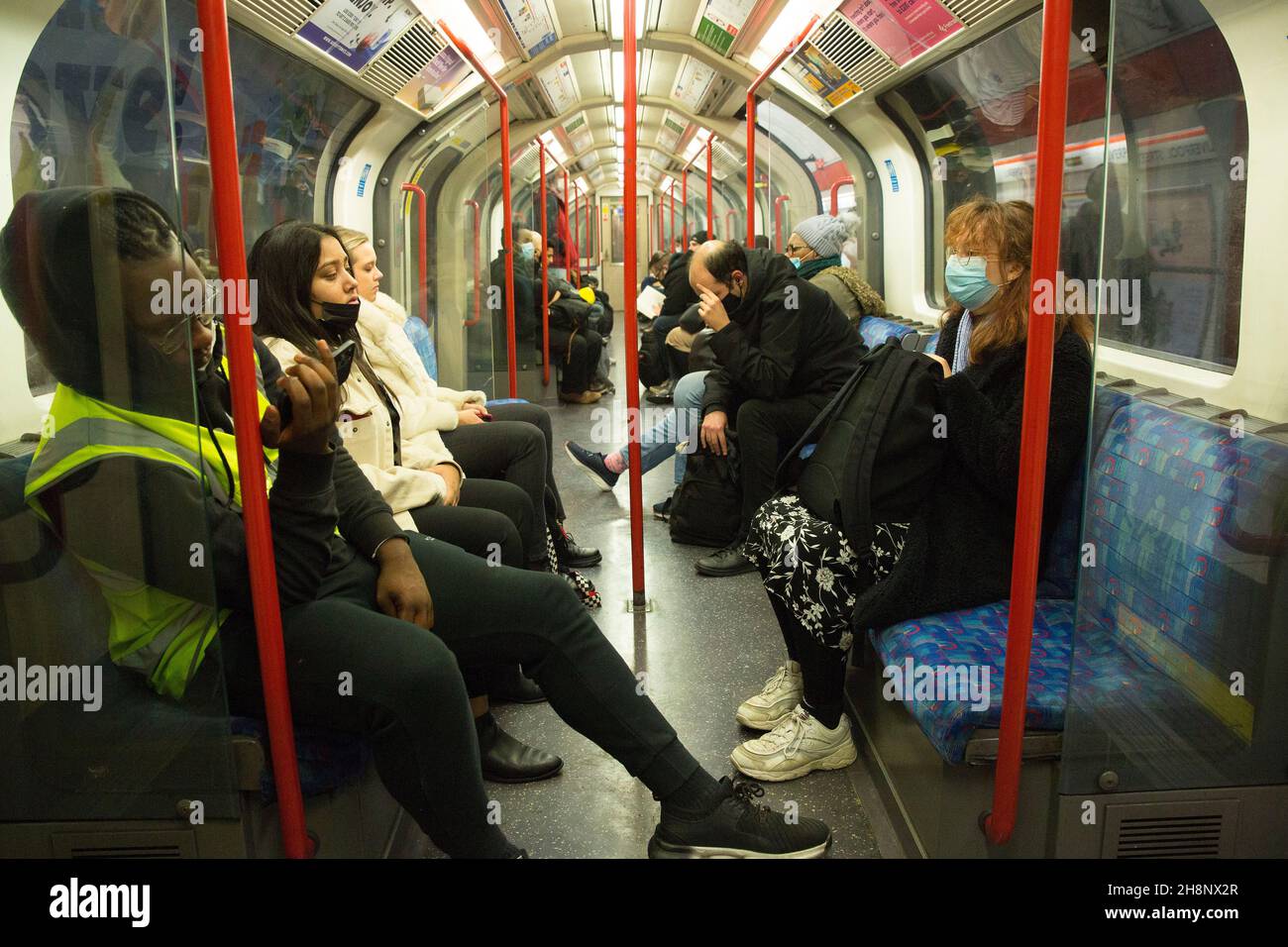 Some commuters are seen wearing their mask on public transport in