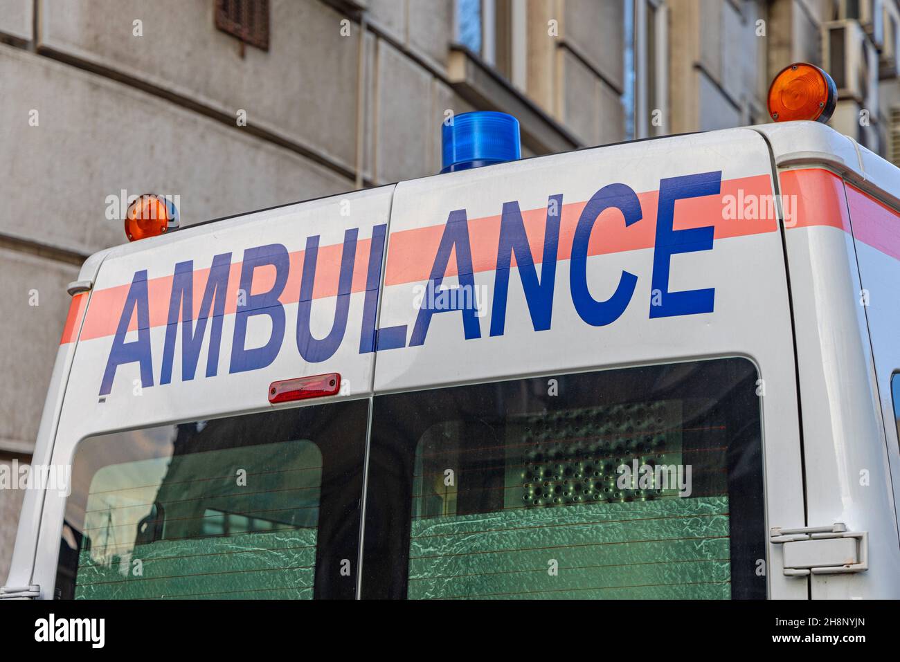 Ambulance Sign at Rear End of Emergency Vehicle Stock Photo