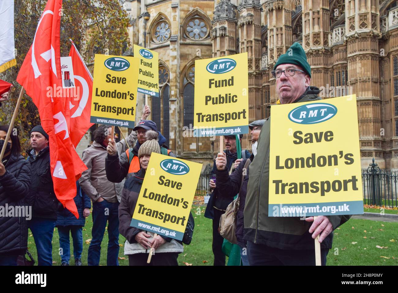 London, UK. 01st Dec, 2021. Protesters hold 'Save London's Transport' placards during the demonstration. Transport workers, union members and supporters gathered at Old Palace Yard outside Parliament in protest against threats to salaries and pensions, and threats to services and jobs, which were imposed as part of the bailout of Transport For London. (Photo by Vuk Valcic/SOPA Images/Sipa USA) Credit: Sipa USA/Alamy Live News Stock Photo