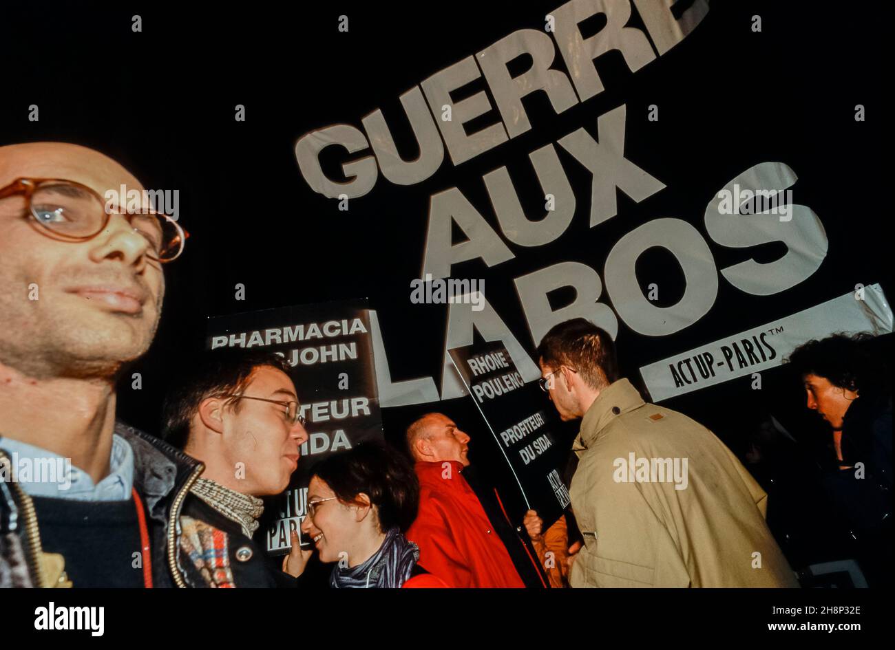 Paris, France, Crowd AIDS Activists Act Up Paris NGO Marching World AIDS Day, Dec. 1,  Anti Big Pharma Slogans, 1999 'Guerre aux labos' Stock Photo