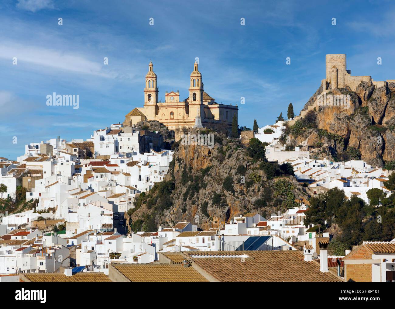 Olvera, Cadiz Province, Andalusia, southern Spain.  Overall view of town with Parroquia de Nuestra Señora de la Encarnación (the Parish of Our Lady of Stock Photo