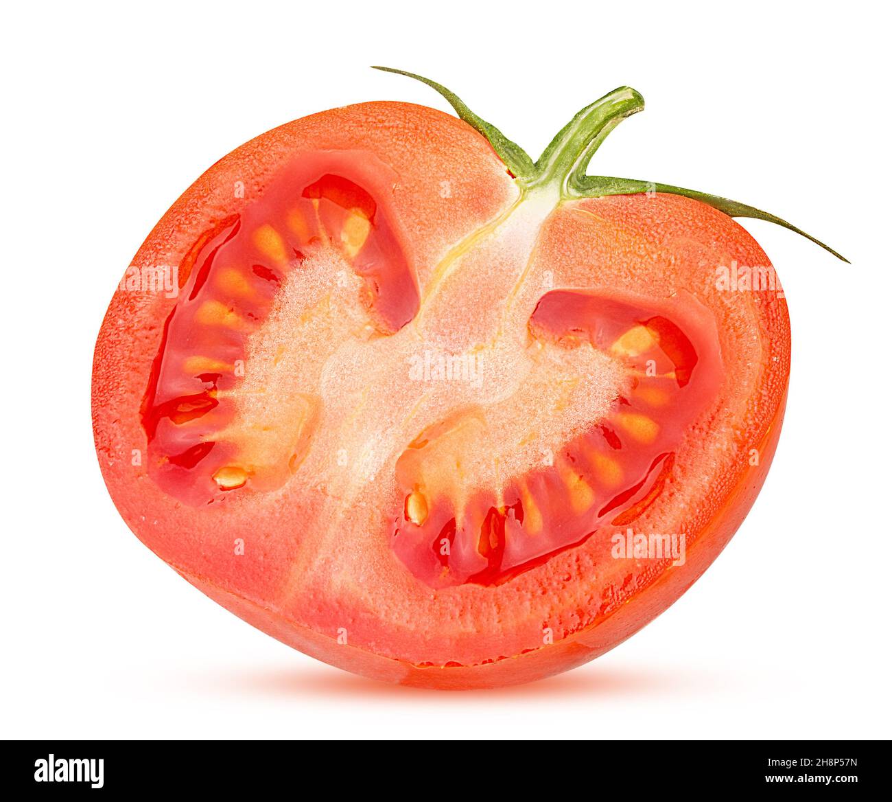 Fresh red tomato cut in half with green leaves isolated on white background Clipping Path. Full depth of field. Stock Photo