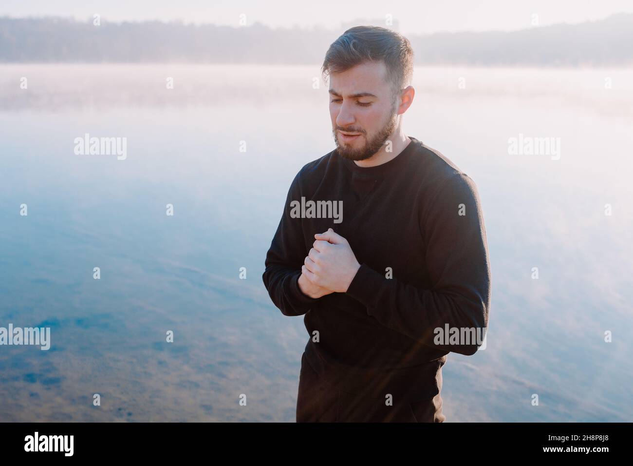 Man doing warmup and preparing for morning routine Stock Photo