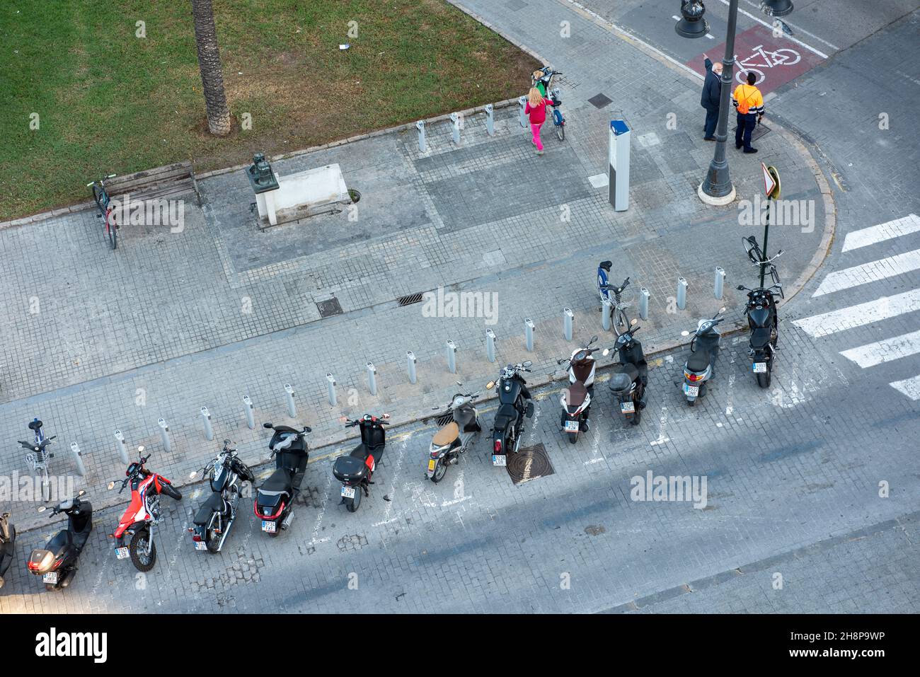City parking of motorcycles and scooters Stock Photo