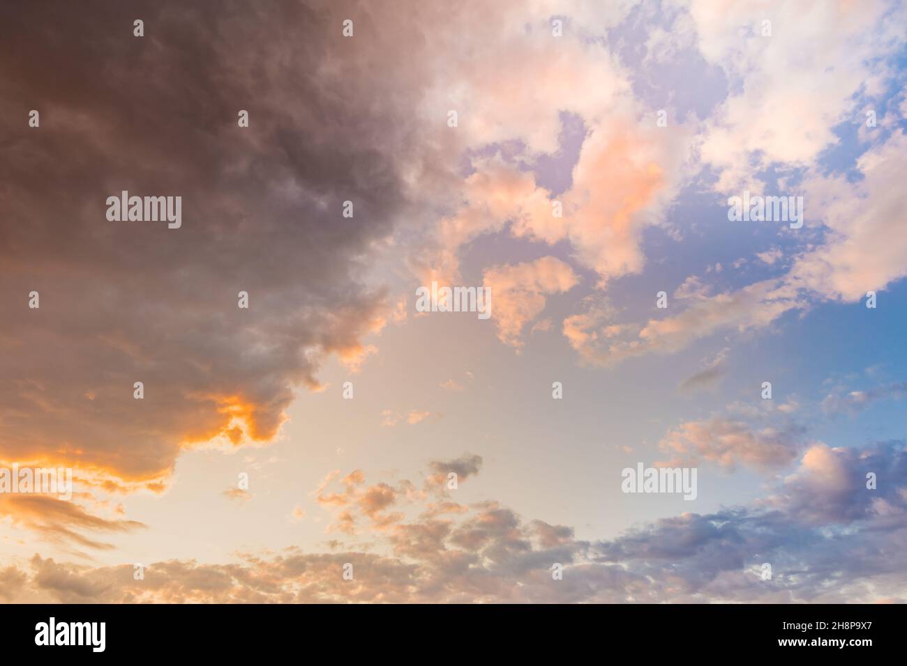 Wide angle view of sunset sunrise sky. Colorful sunset twilight sky, bright sun. Nature sky backgrounds. Idyllic relaxing tranquil freedom concept Stock Photo