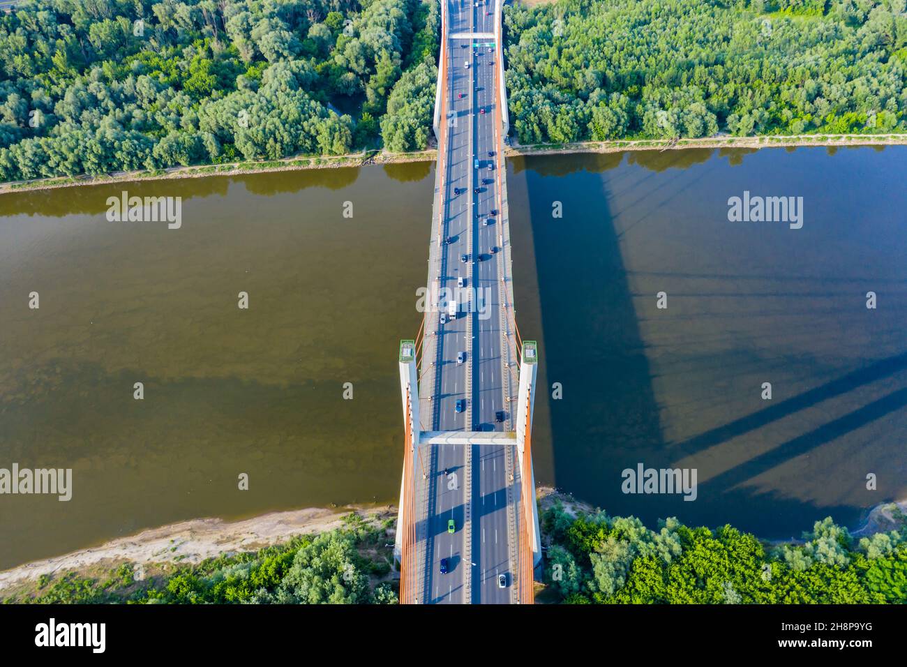 Aerial Drone Flight top down View of freeway busy city rush hour heavy traffic jam highway. Aerial view of the vehicular intersection, traffic at peak Stock Photo