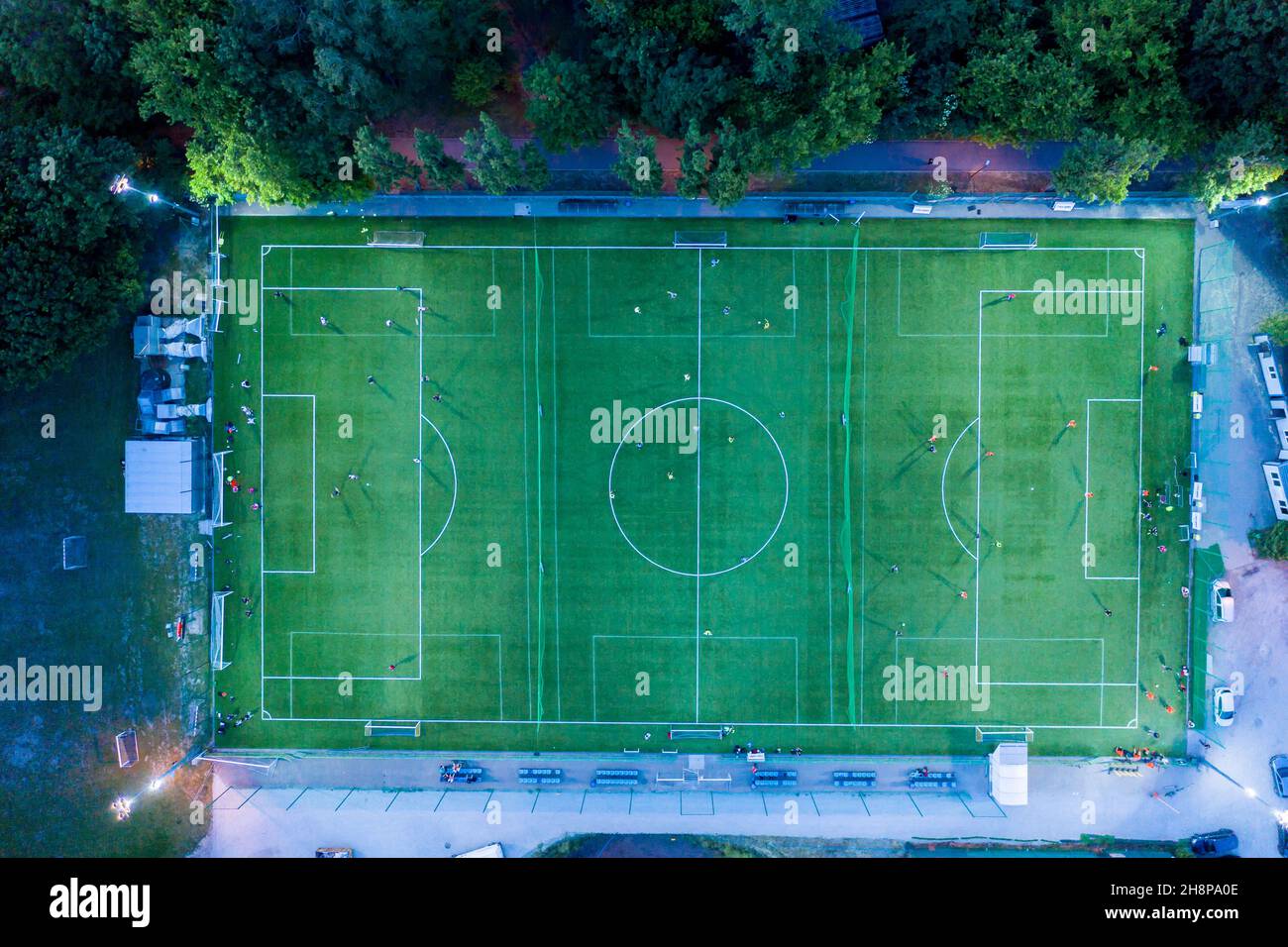 Aerial view on football stadium illuminated by jupiter on evening Stock