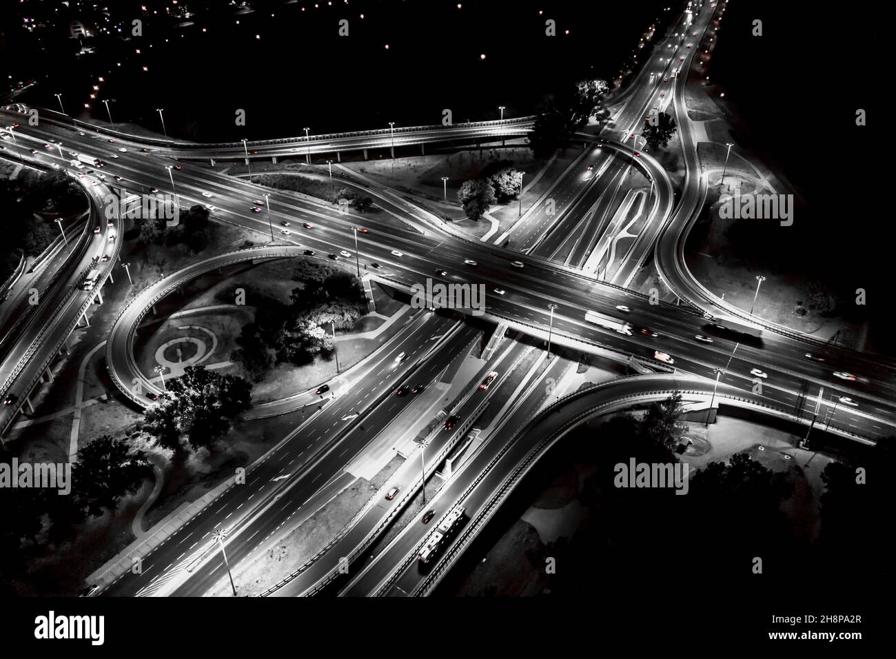 Aerial view Expressway motorway highway circus intersection at Night time Top view , Road traffic in city Stock Photo