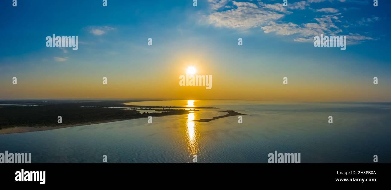 Minimalist aerial seascape - sunset over calm water. Baltic Sea. Stock Photo