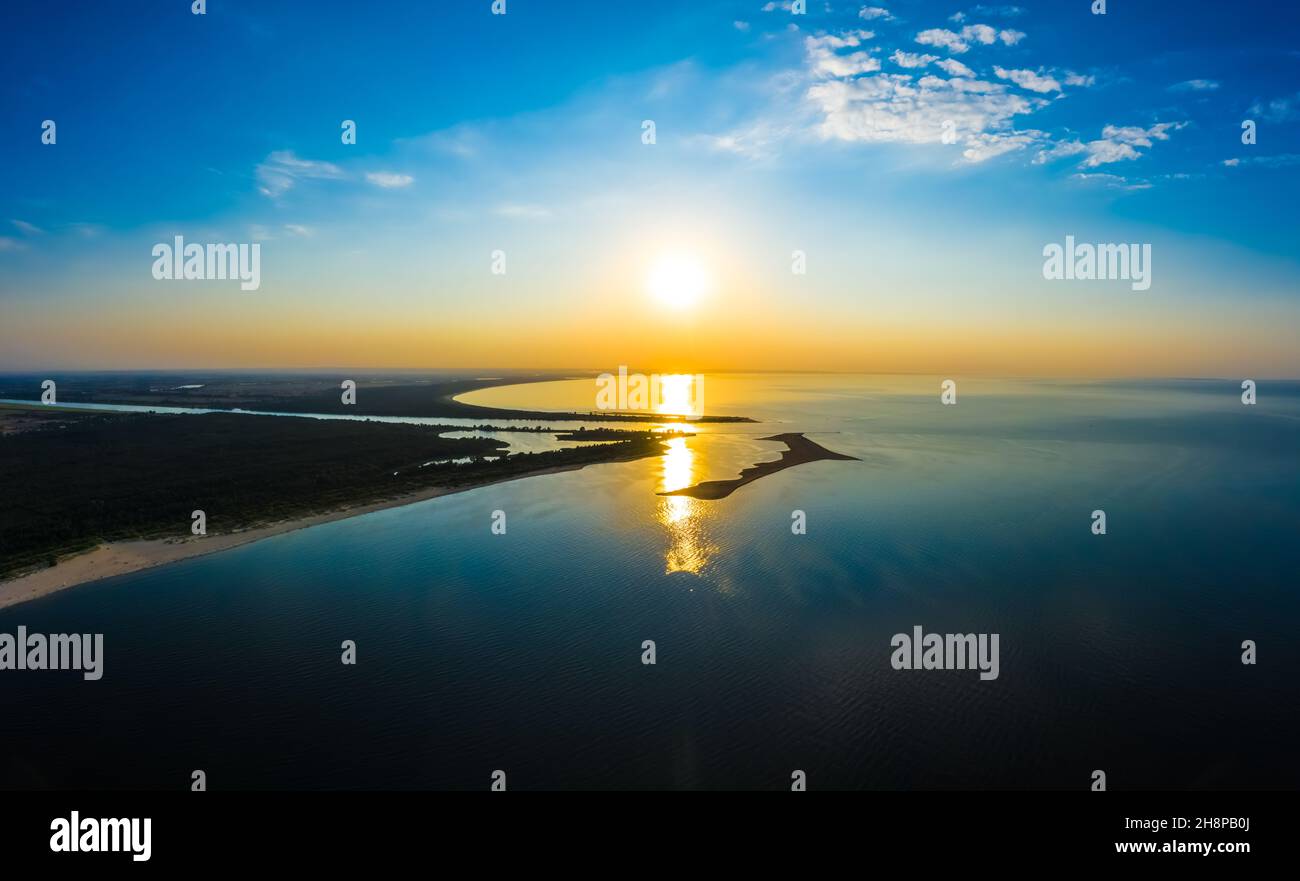 Minimalist aerial seascape - sunset over calm water. Baltic Sea. Stock Photo