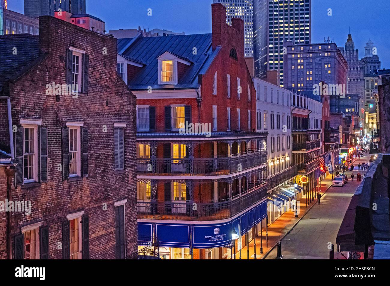 Shops, bars and restaurants at night in Bourbon Street, French Quarter