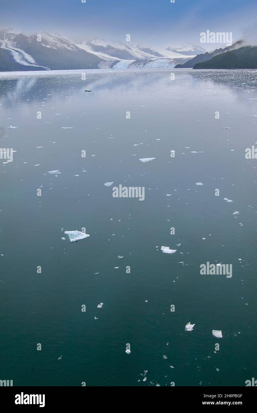 Foggy blue sky over College Fjord Glacier in Alaska Stock Photo