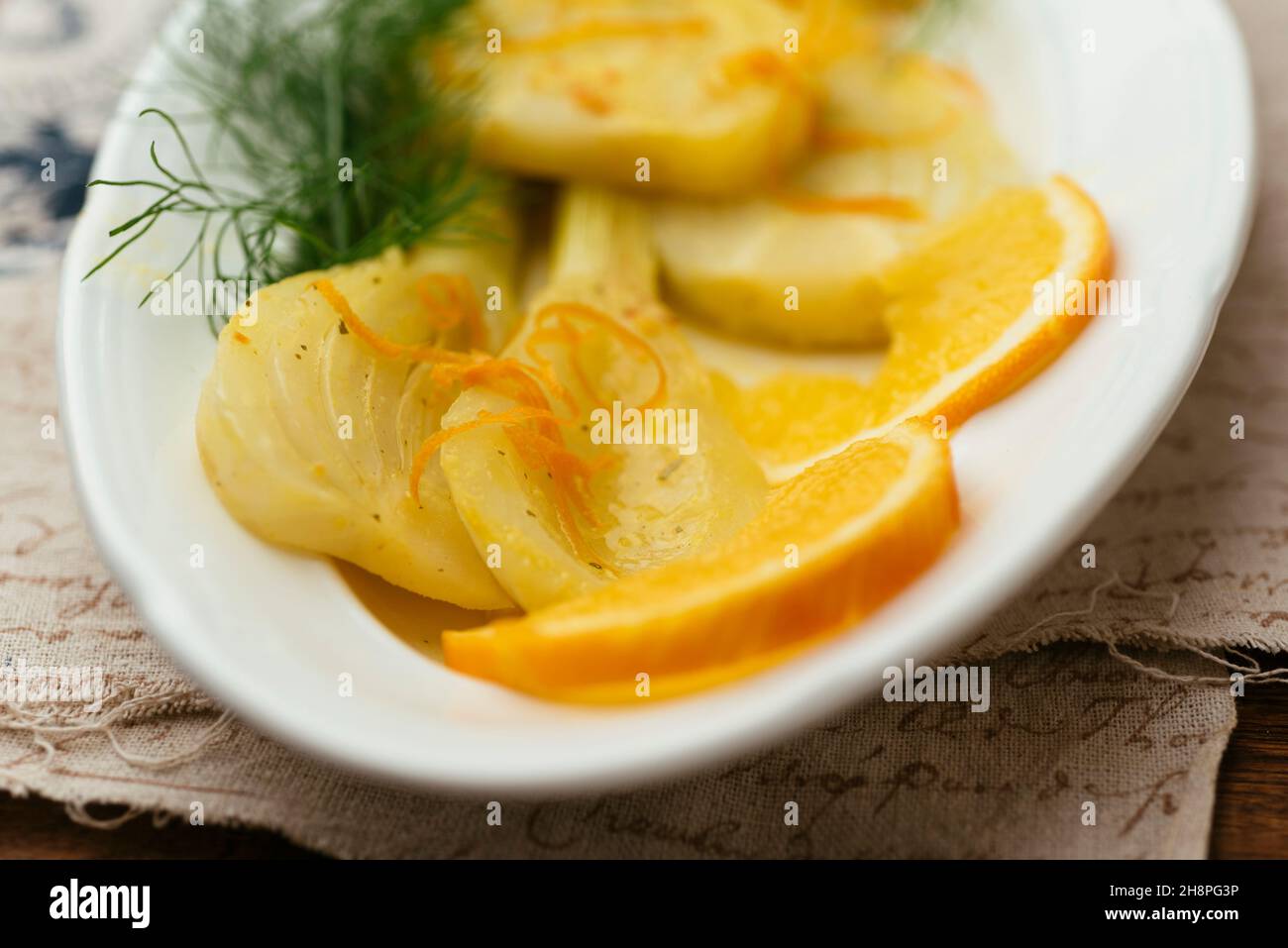 Home made orange braised fennel as side dish. Stock Photo