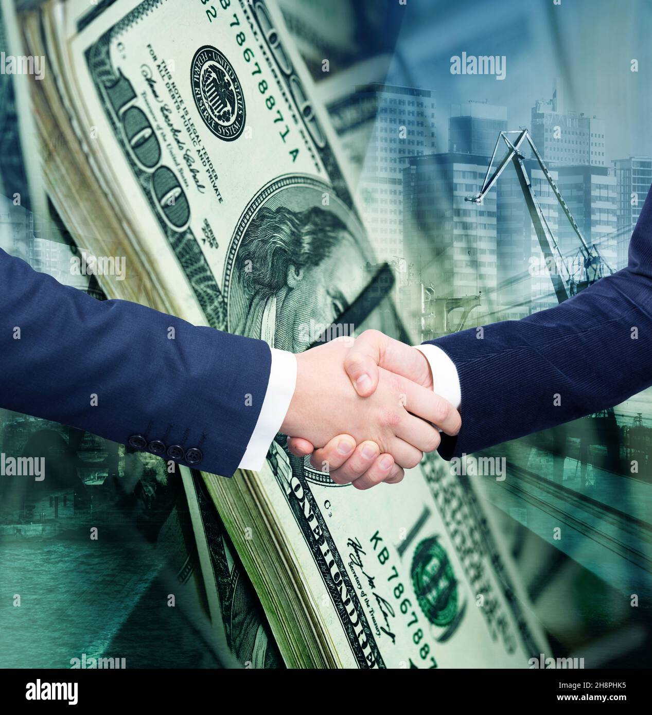 Businessmen shaking hands on background banknotes Stock Photo