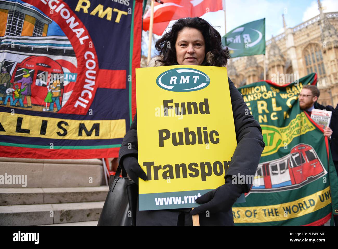 Joint transport union protest supported by Unite, RMT, Aslef, TSSA and the ITF, at Old Palace yard, opposite Parliament. Transport workers in London are facing job, pay and pension cuts in relation to the government's TFL bailout caused by the pandemic. during the demonstration. Stock Photo