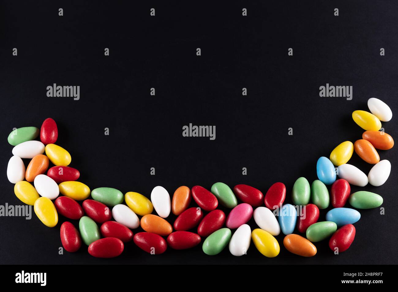 Colorful Easter eggs on a black surface Stock Photo