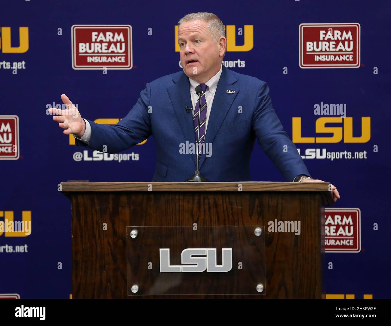 December 1, 2021 New LSU Head Football Coach Brian Kelly holds his