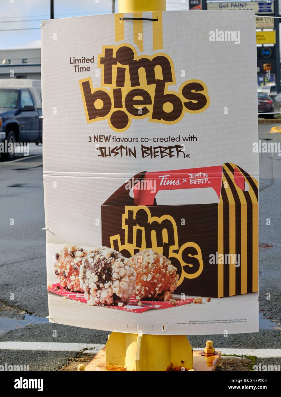 Sign announcing special Tim Biebs donuts created by Justin Bieber at Tim Hortons restaurant. Halifax, Canada. December 1, 2021. Stock Photo