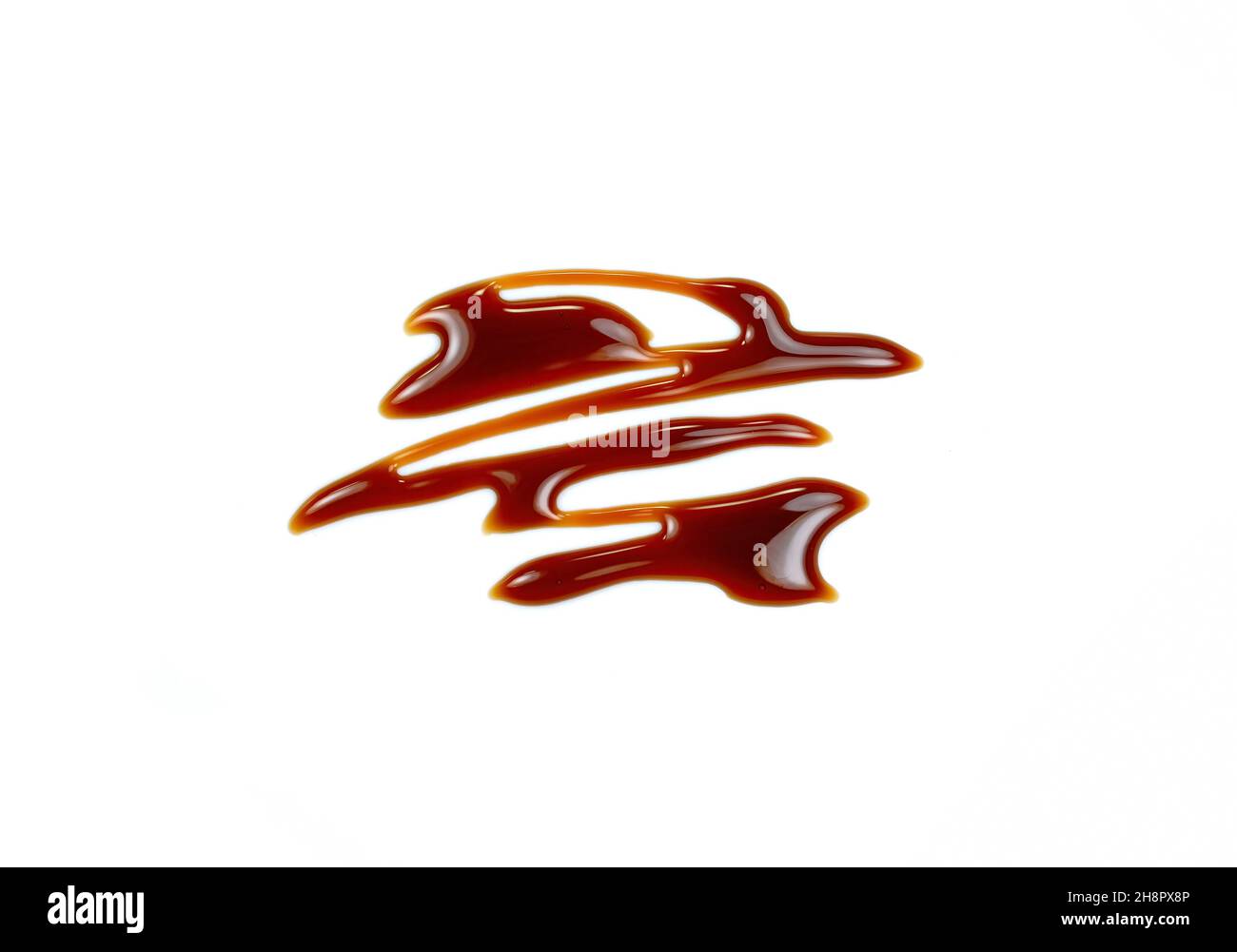 Pomegranate sauce dressing isolated on white. Pomegranate syrup puddle ...