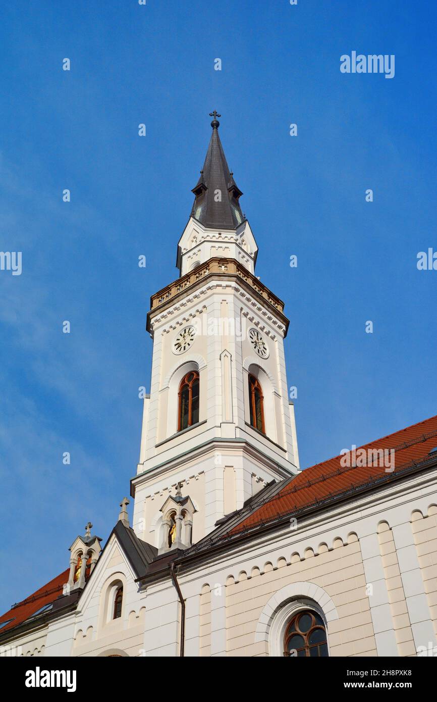 Celje, Slovenia, January 04, 2020. Bell tower of the Assumption of Mary catholic church in Celje, Slovenia Stock Photo