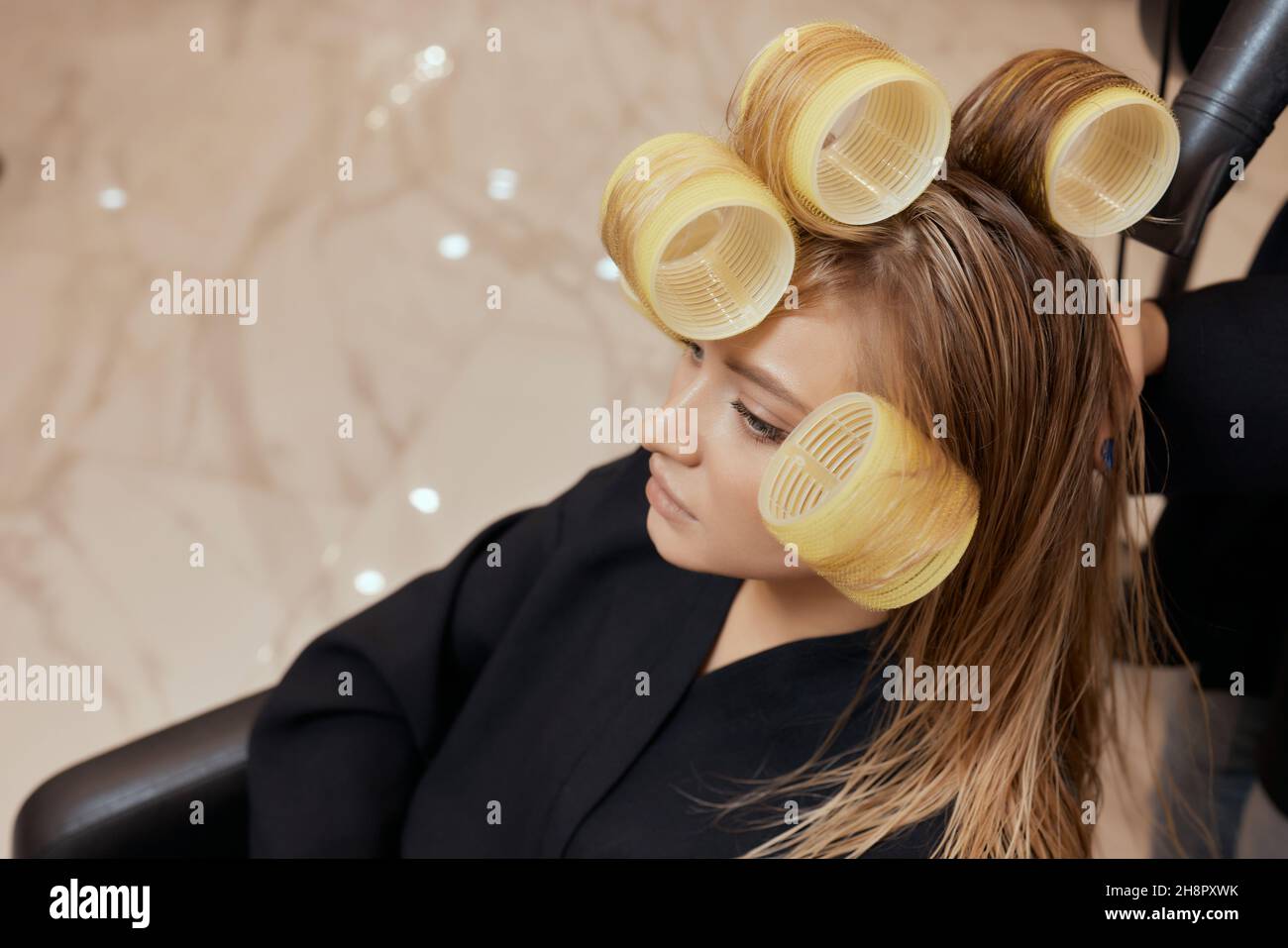Blond long hair round hi-res stock photography and images - Alamy