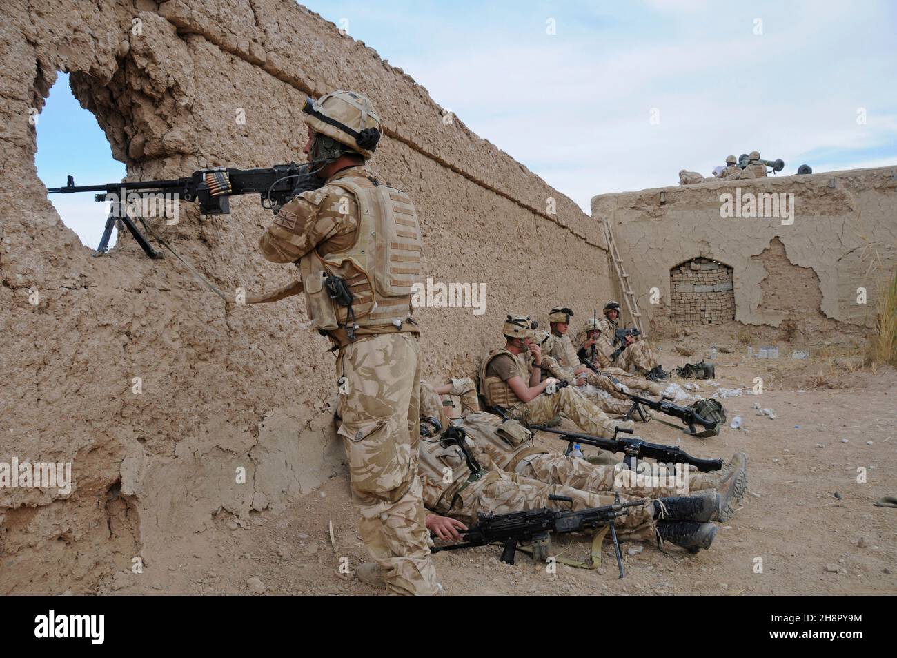 British Royal Marine commandos man a sniper post during Operation Sond Chara clearing Nad-e Ali District, Helmand province of insurgents December 30, 2008 in Lashkar Gah, Afghanistan. Stock Photo