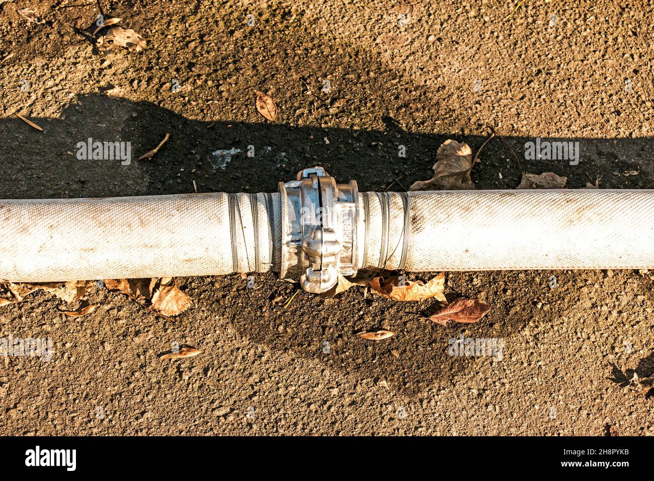 Connection of pipes for pumping water from the pond using a coupling