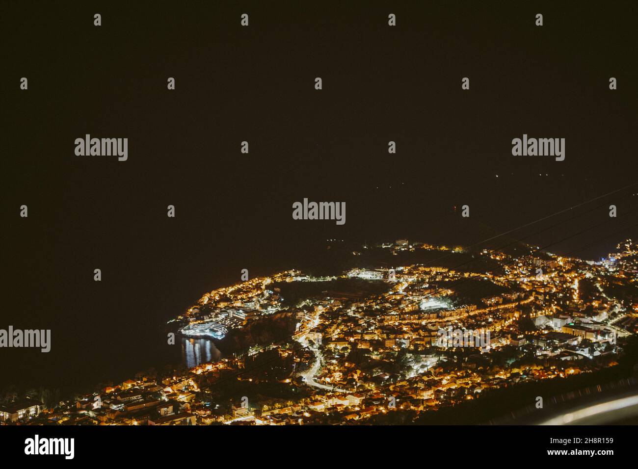 Aerial view of an illuminated city at night Stock Photo - Alamy