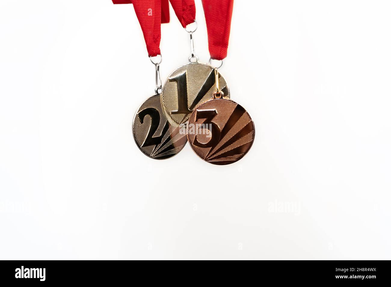 gold, silver and bronze medals with numbers on white isolated background for winners.Medal with