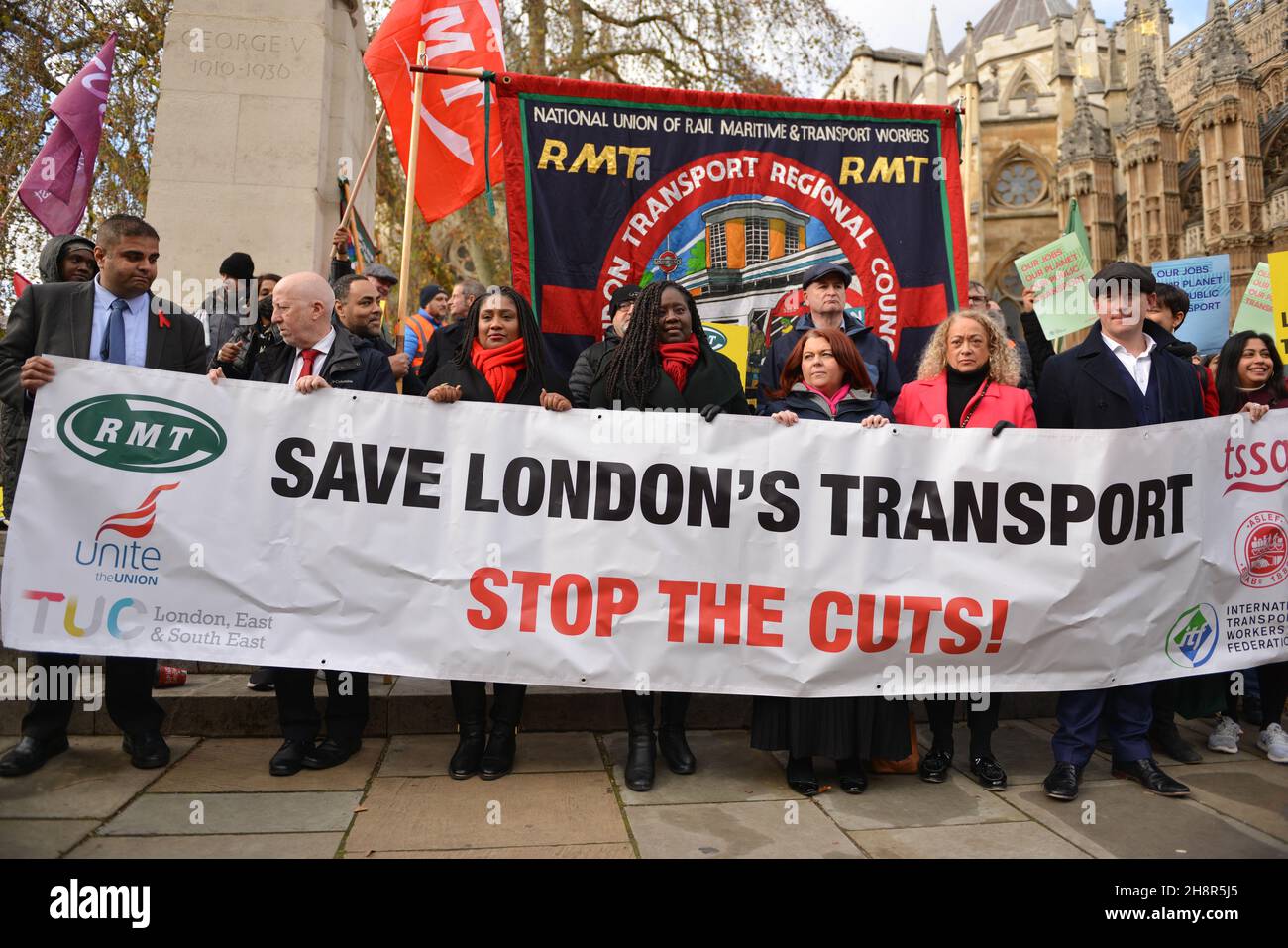 London, UK. 01st Dec, 2021. Protesters hold a banner during the demonstration.Joint transport union protest supported by Unite, RMT, Aslef, TSSA and the ITF, at Old Palace yard, opposite Parliament. Transport workers in London are facing job, pay decrease and pension cuts in relation to the government's TFL bailout caused by the pandemic. Credit: SOPA Images Limited/Alamy Live News Stock Photo