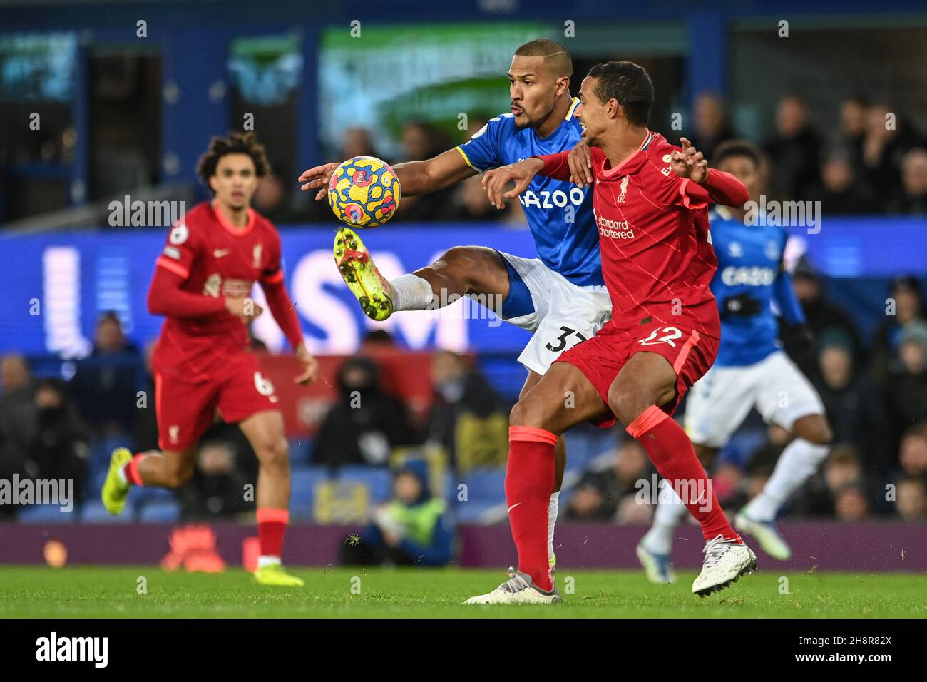 Liverpool, UK. 01st Dec, 2021. Jose Salomon Rondon #33 of Everton and Joel Matip #32 of Liverpool battle for the ball in Liverpool, United Kingdom on 12/1/2021. (Photo by Craig Thomas/News Images/Sipa USA) Credit: Sipa USA/Alamy Live News Stock Photo