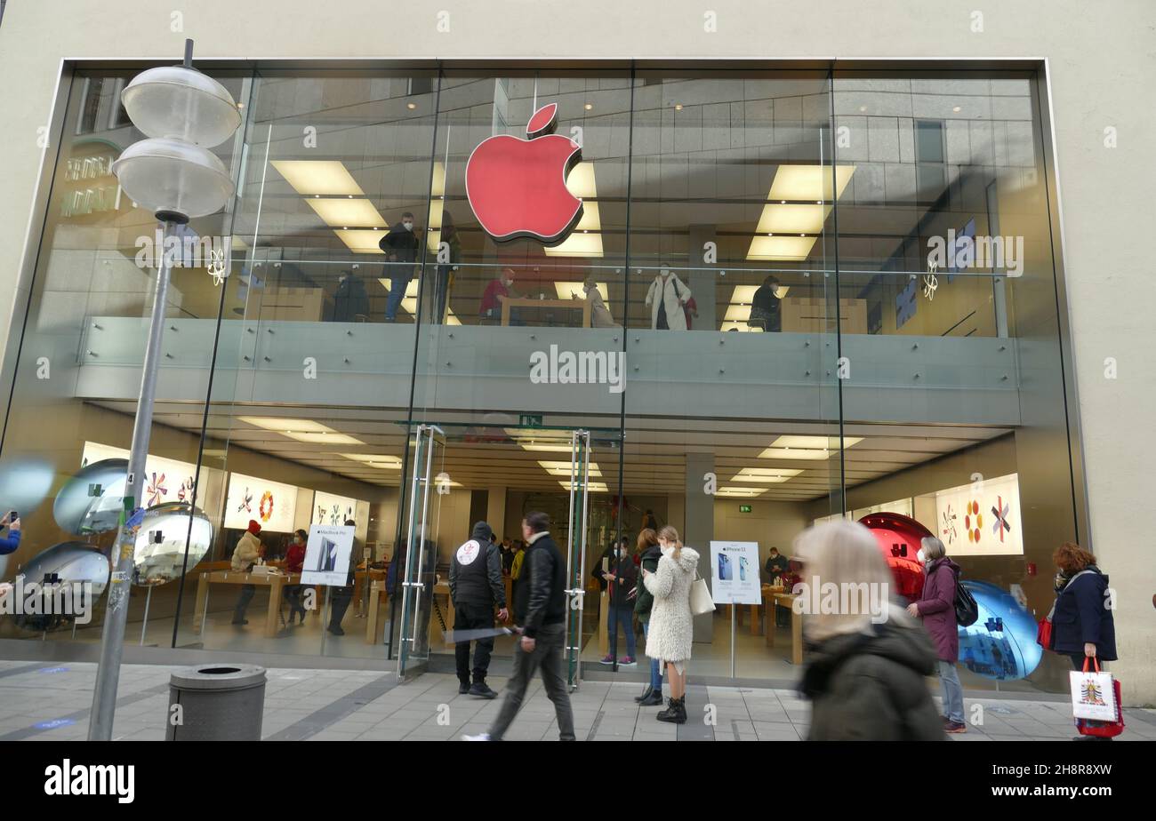 Apple store logo in red because of World Aids Day in December 2021. Stock Photo