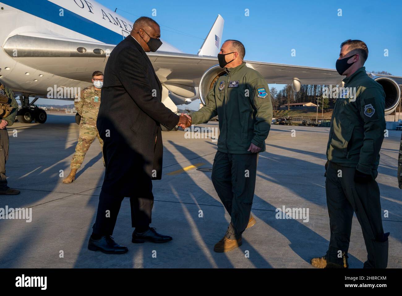 Pyeongtaek, South Korea. 01st Dec, 2021. U.S. Secretary of Defense Lloyd J. Austin III, left, greets Lt. Gen. Scott L. Pleus, Deputy Commander, U.S. Forces Korea and Col. Joshua Wood, Commander, 51st Fighter Wing after arriving at Osan Air Base December 1, 2021 in Pyeongtaek, South Korea. Austin is visiting Korea to meet with senior government leaders at the U.S.-Korea Security Consultative Meeting. Credit: Chad McNeeley/DOD/Alamy Live News Stock Photo