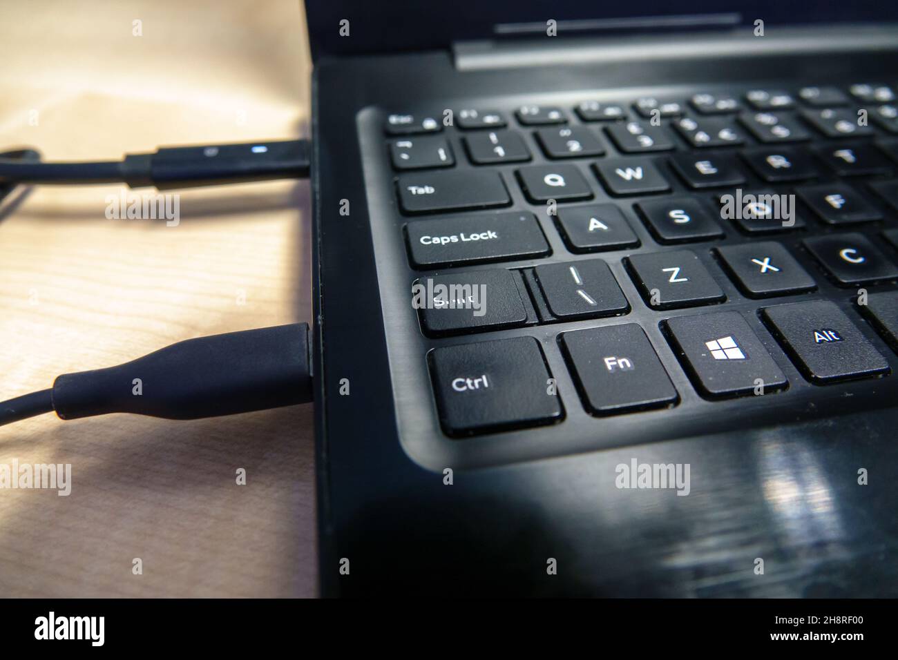 letf hand side of a white letter on black key laptop windows keyboard