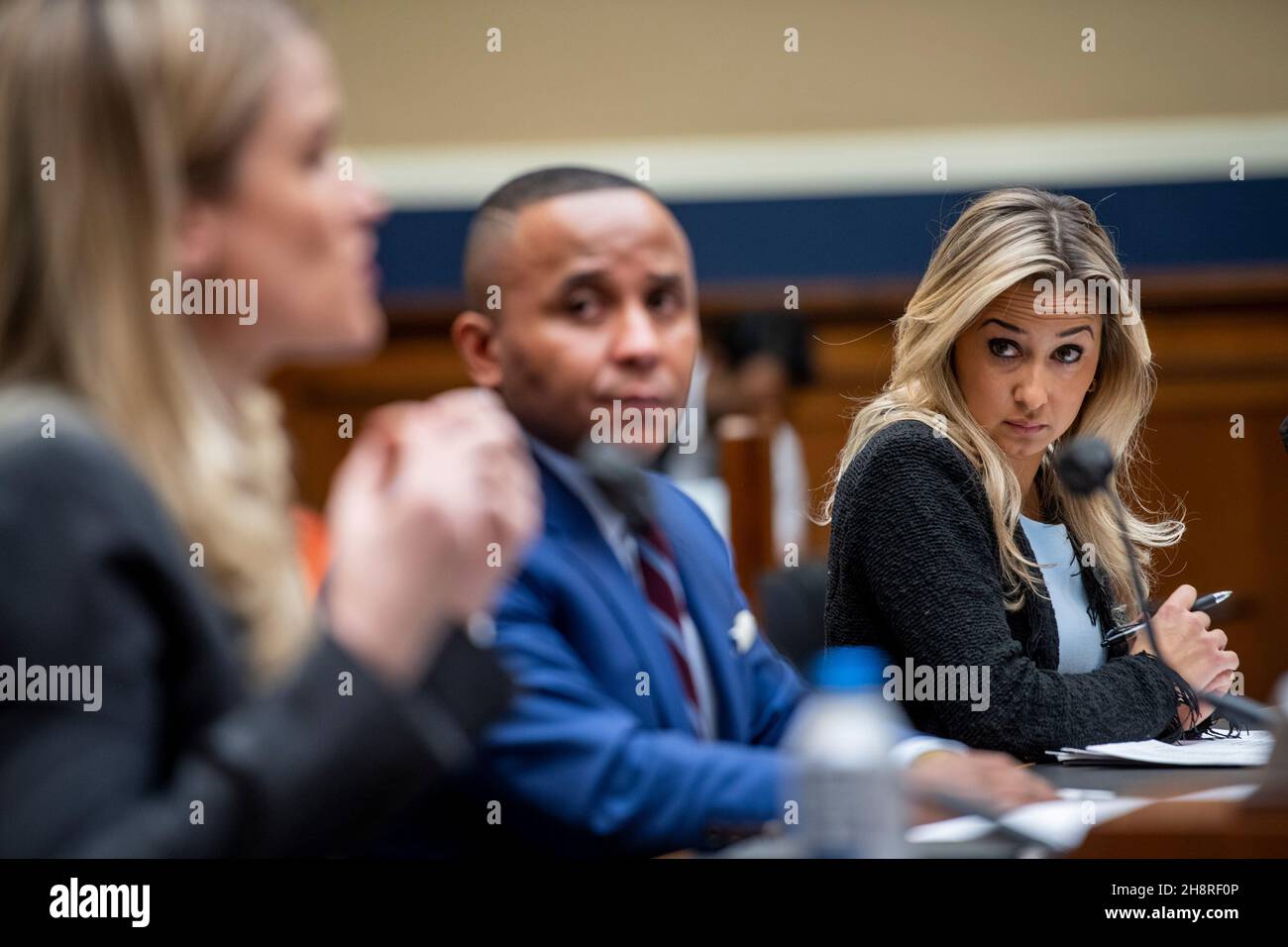 Kara Frederick, Research Fellow in Technology Policy, The Heritage Foundation, right, and Rashad Robinson, President, Color of Change, center, listen while Frances Haugen, Former Facebook Employee, left, responds to questions during a House Committee on Energy and Commerce | Subcommittee on Communications and Technology hearing “Holding Big Tech Accountable: Targeted Reforms to Techs Legal Immunity” in the Rayburn House Office Building in Washington, DC, Wednesday, December 1, 2021. Credit: Rod Lamkey/CNP/Sipa USA Stock Photo