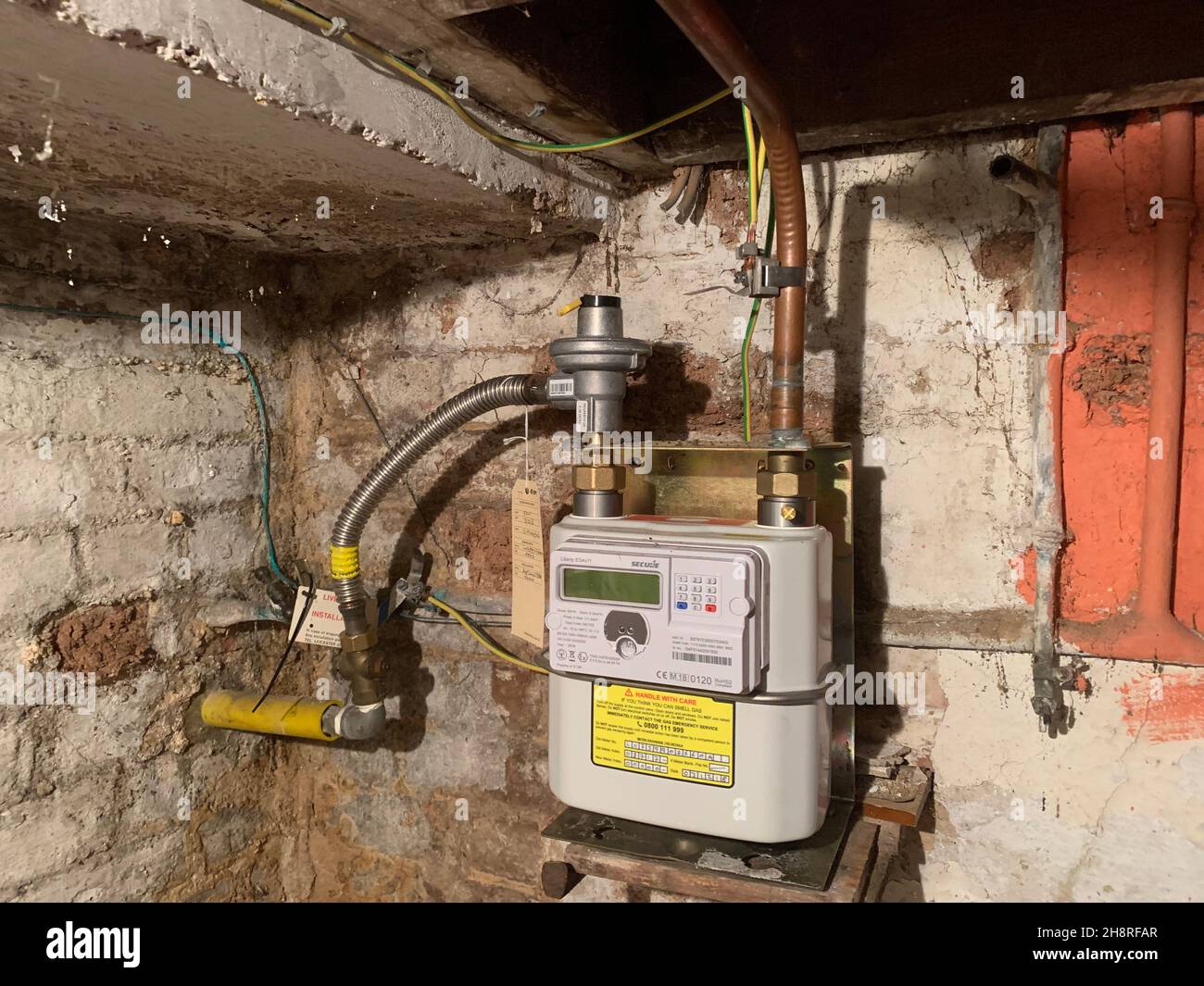 British Gas meter with copper pipes in a cellar England Stock Photo Alamy