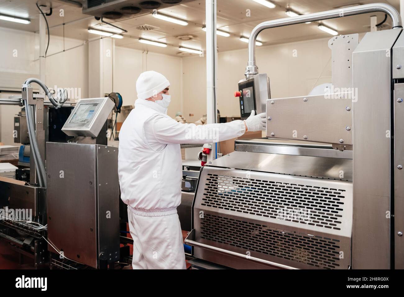 Automated production line with packaging and cutting of meat in modern ...