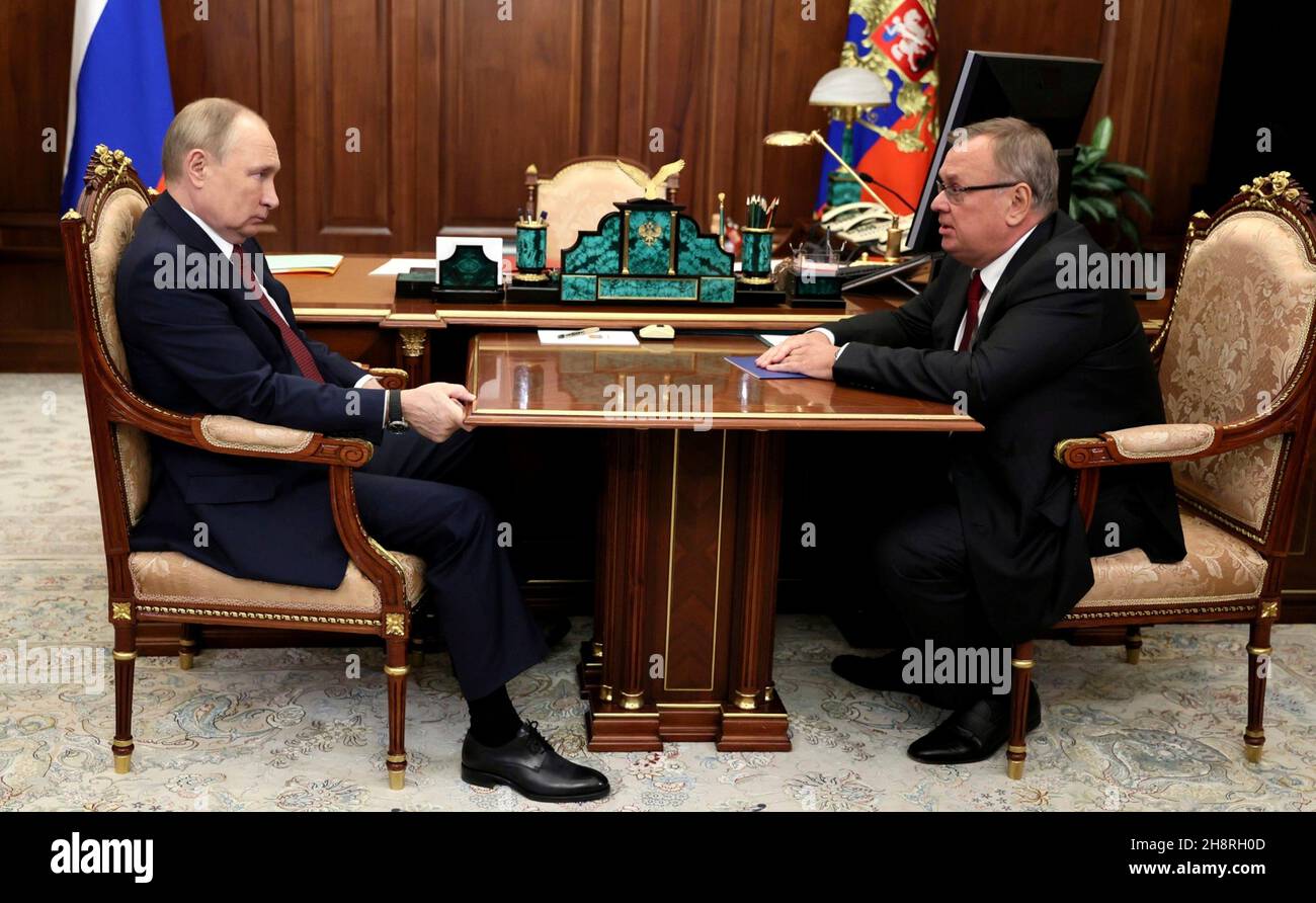Moscow, Russia. 30 November, 2021. Russian President Vladimir Putin, left, holds a face-to-face meeting with the Chairman of VTB Bank Management Board Andrei Kostin in the Kremlin, November 29, 2021 in Moscow, Russia.  Credit: Mikhail Klimentyev/Kremlin Pool/Alamy Live News Stock Photo